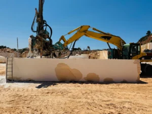 Portuguese limestone block in quarry prepped to be cut